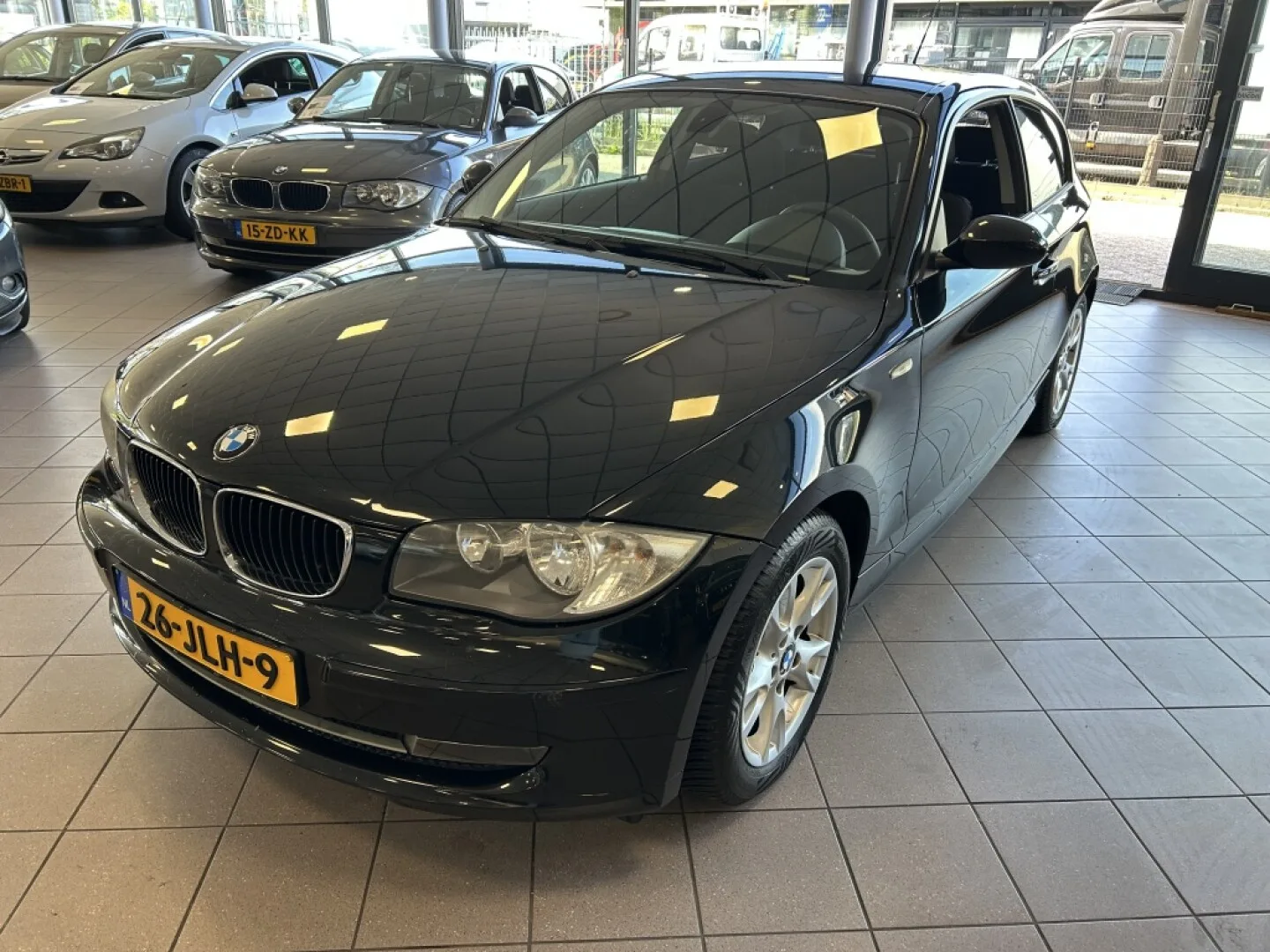 BMW 1-Serie (2009) — foto 1