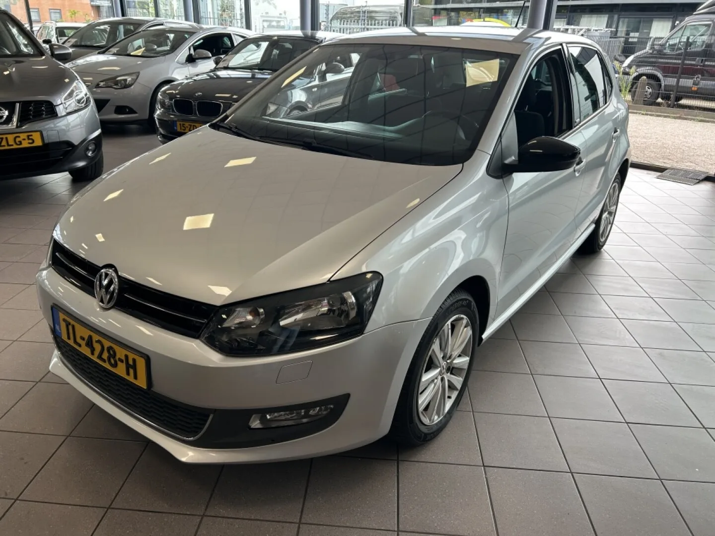 Volkswagen Polo (2011) — foto 1