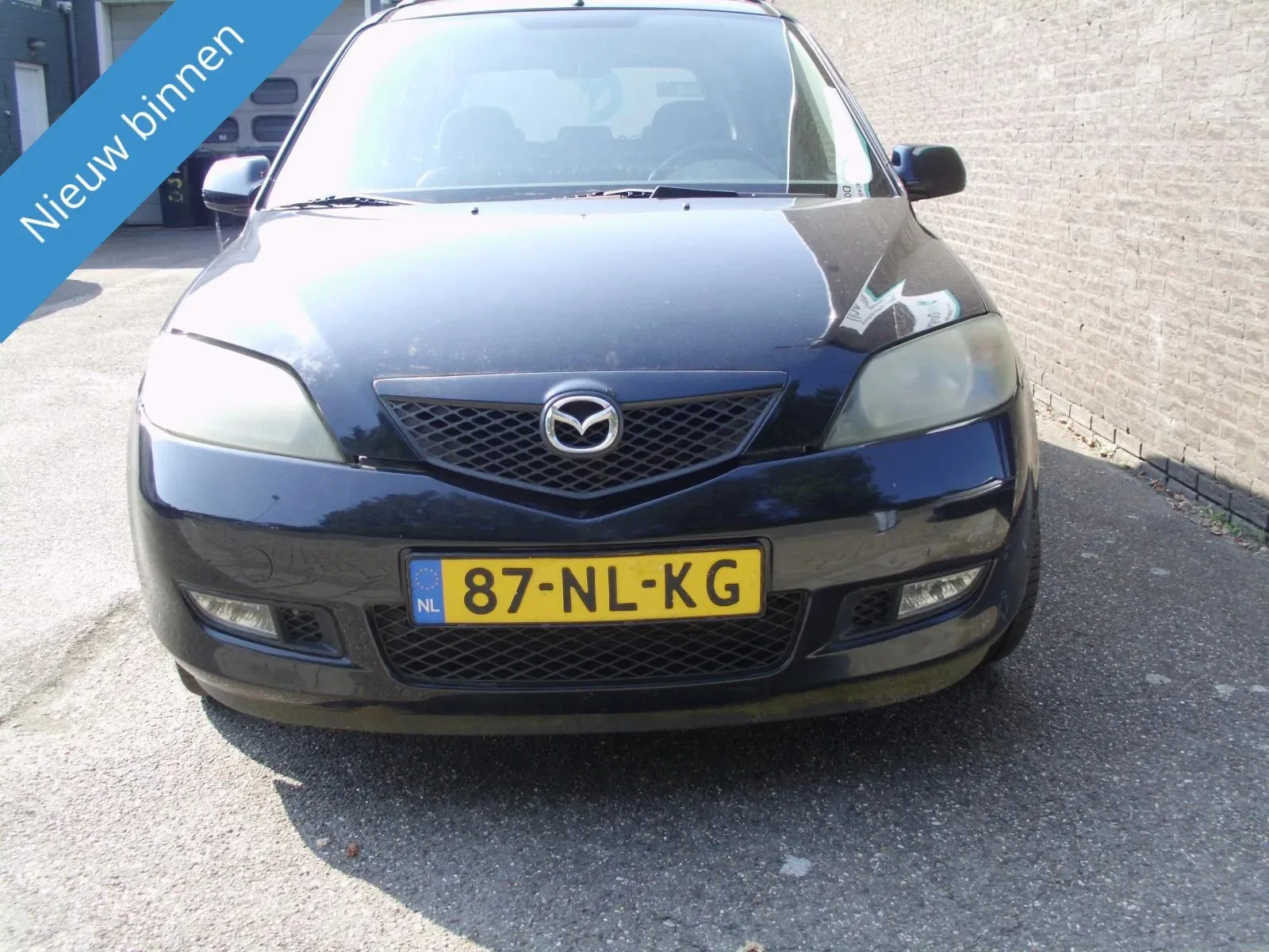 Mazda 2 (2003) — foto 1