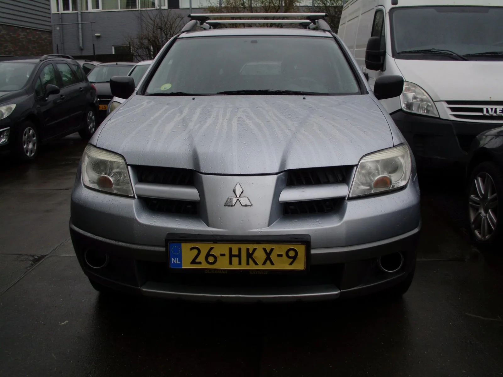 Mitsubishi Outlander (2009) — foto 1