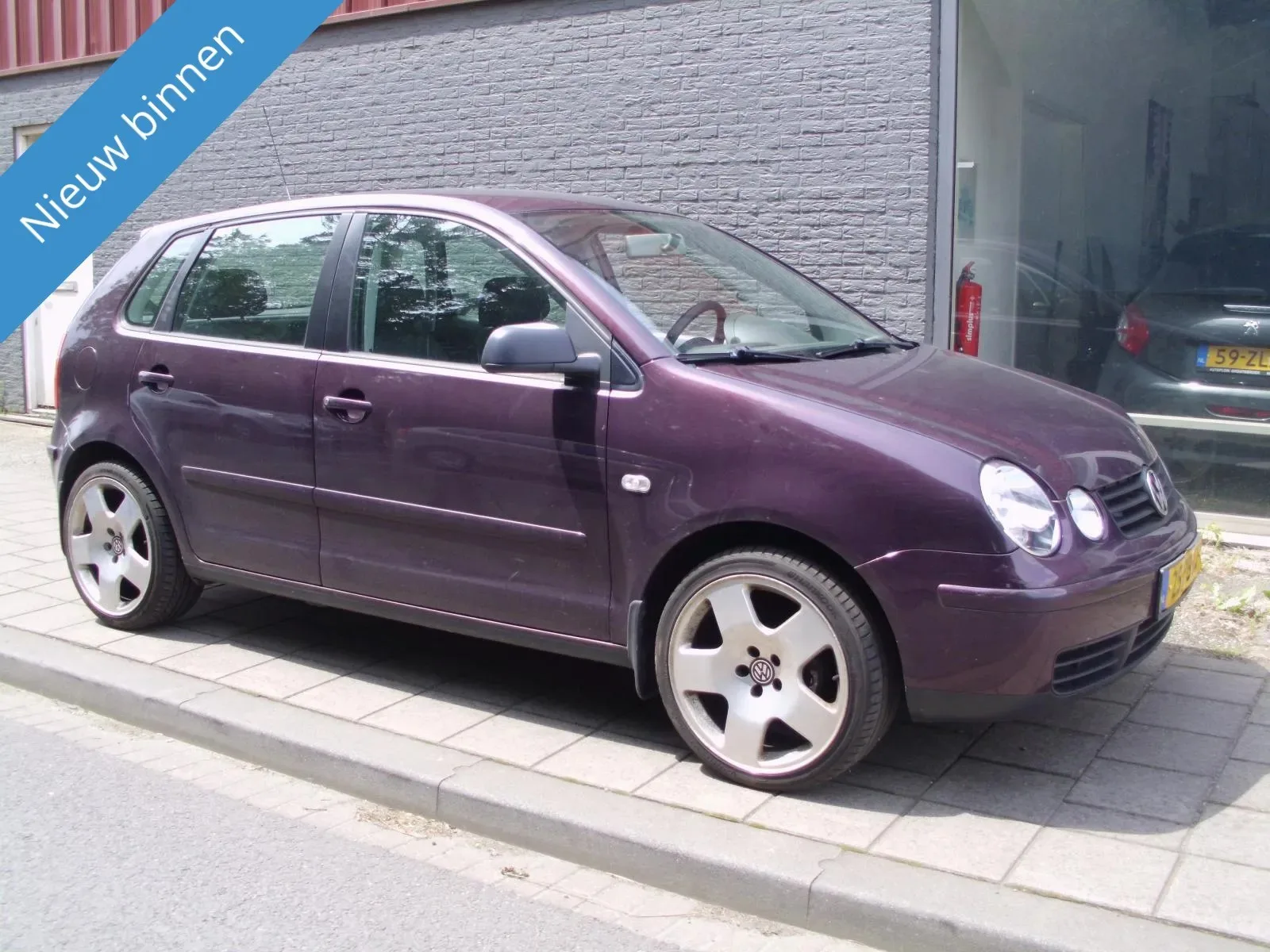 Volkswagen Polo (2004) — foto 1