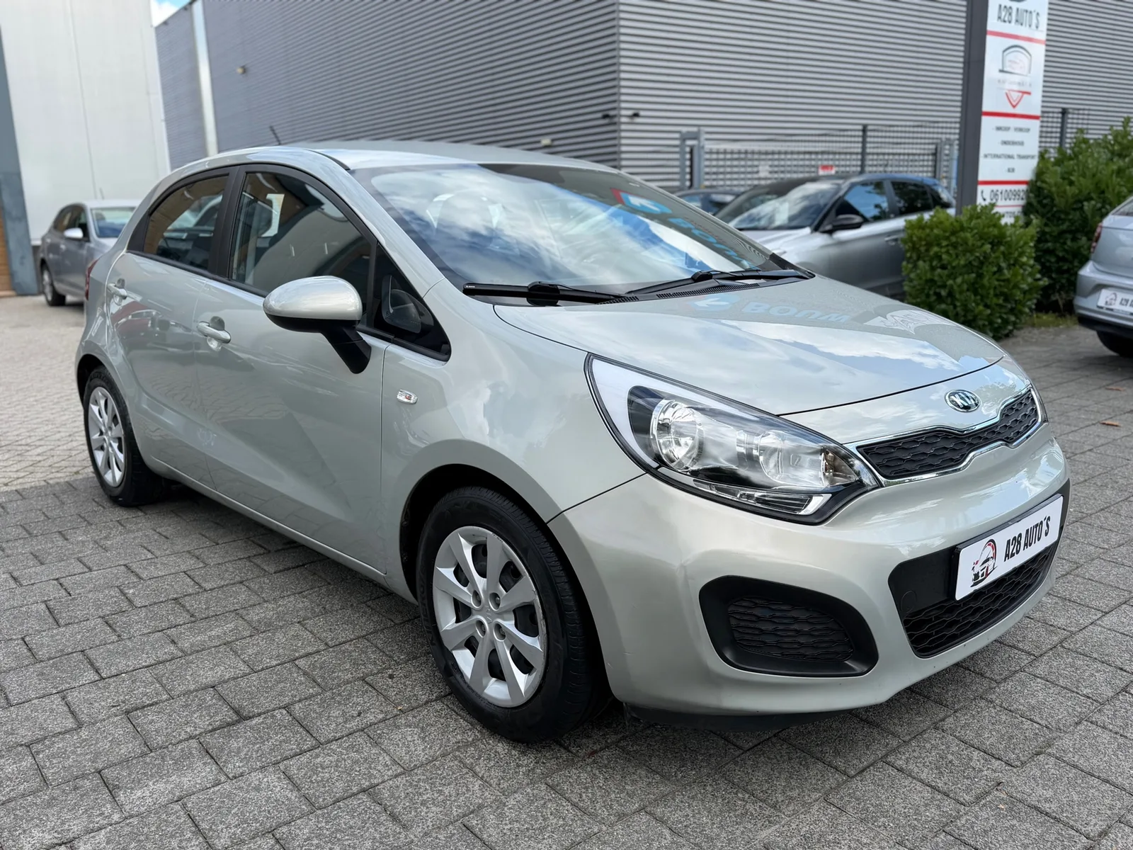Kia Rio (2014) — foto 1