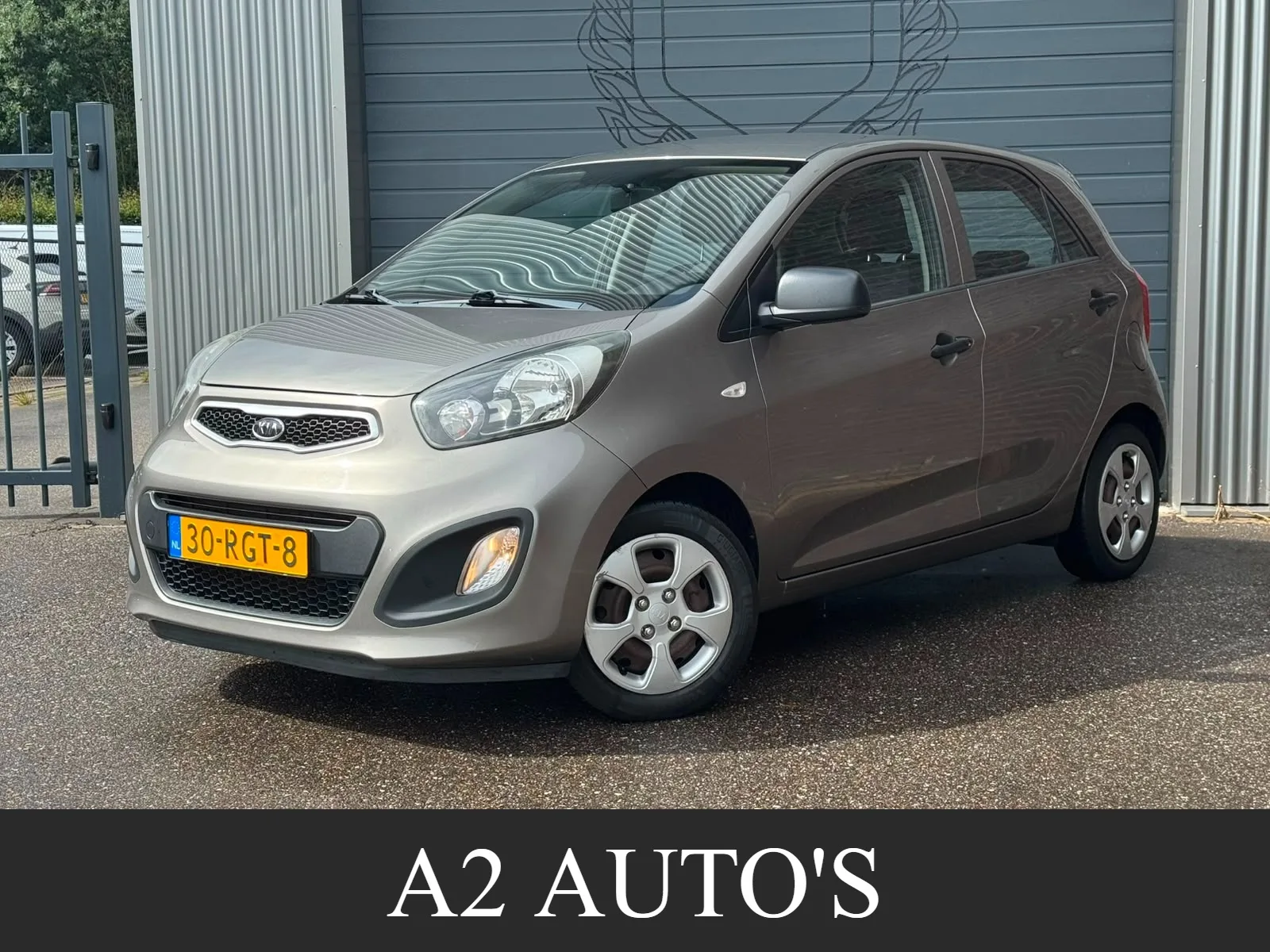 Kia Picanto (2011) — foto 1