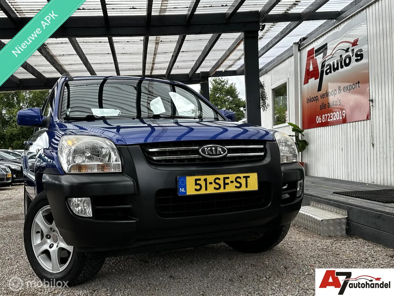 Kia Sportage (2006) — foto 1