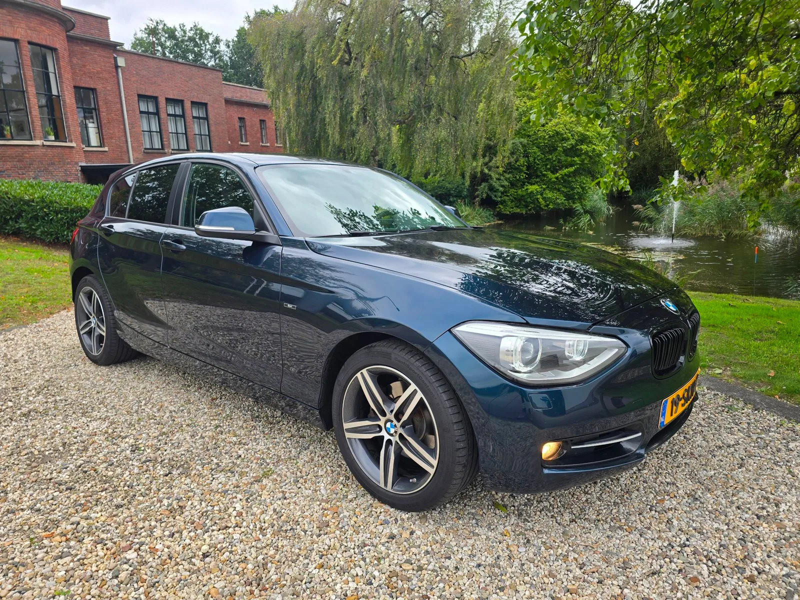 BMW 1-Serie (2011) — foto 1