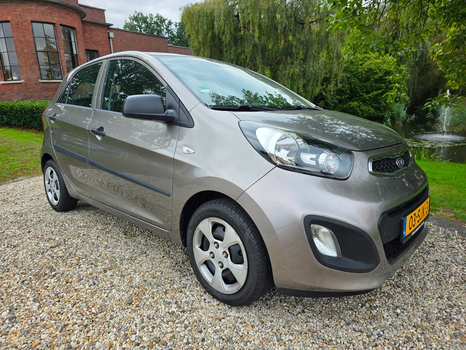 Kia Picanto (2011) — foto 1