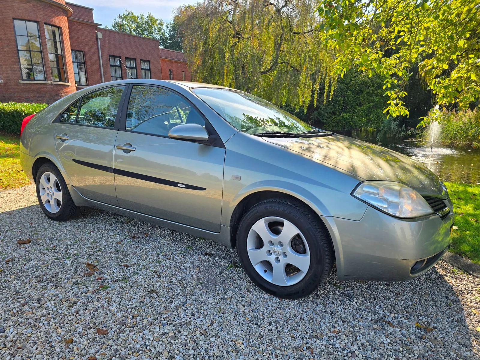 Nissan Primera (2004) — foto 1