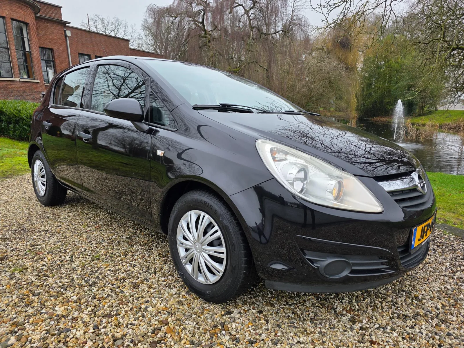 Opel Corsa (2009) — foto 1
