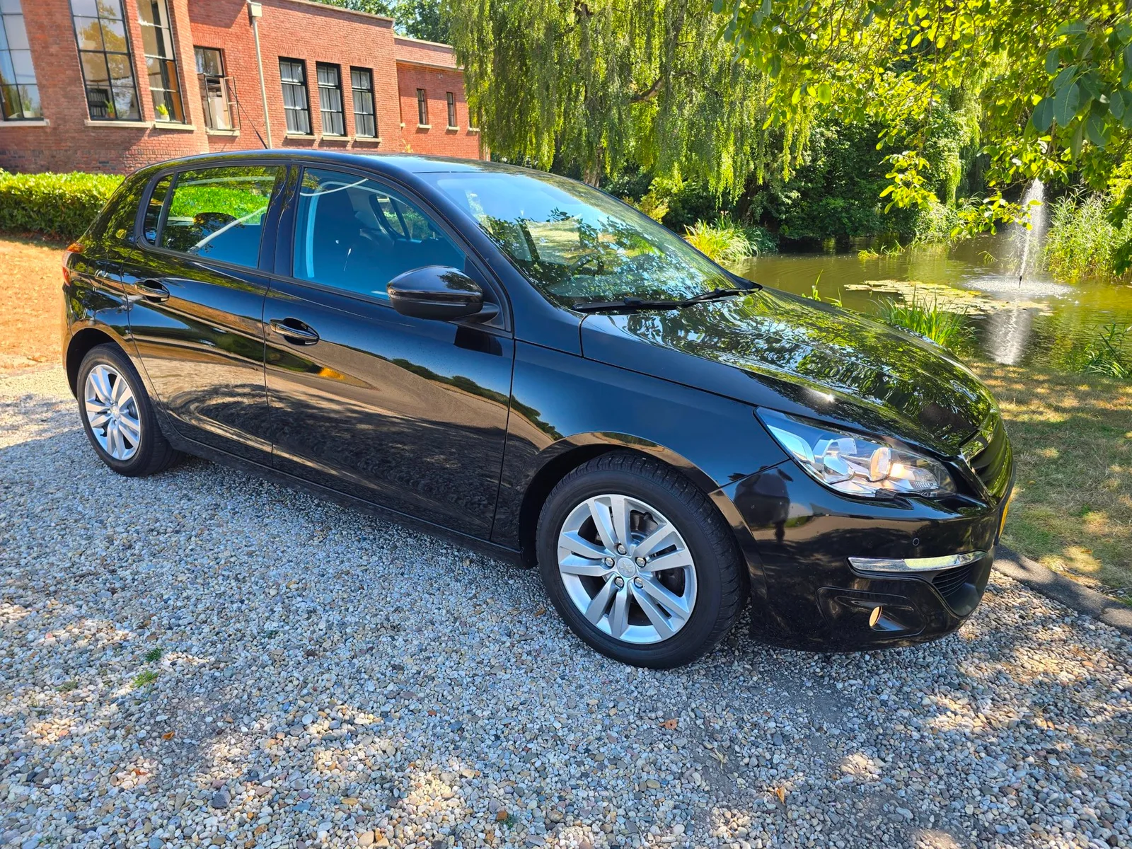 Peugeot 308 (2014) — foto 1