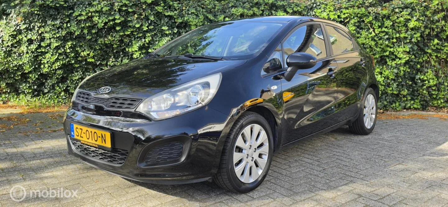 Kia Rio (2012) — foto 1