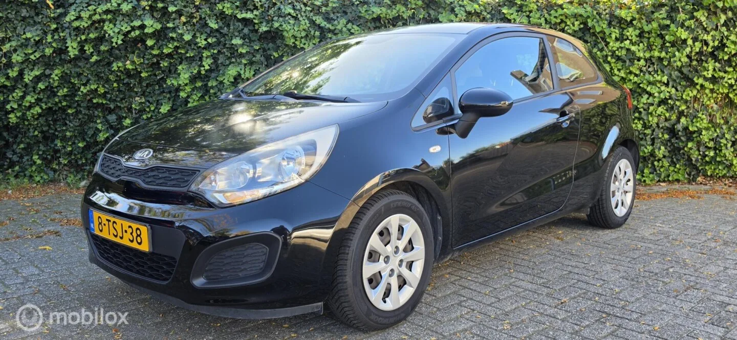 Kia Rio (2014) — foto 1