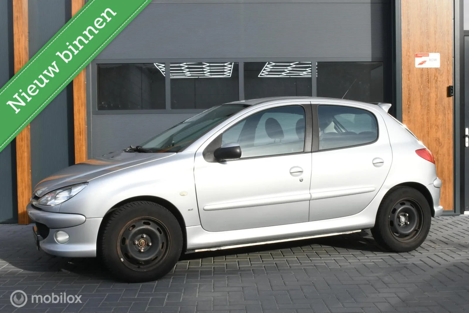 Peugeot 206 (2005) — foto 1