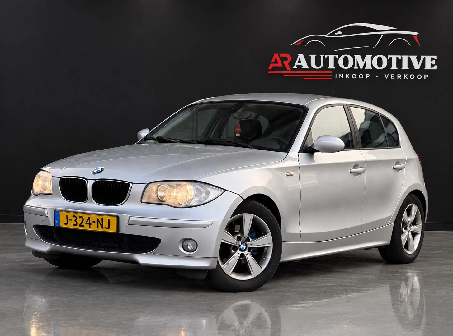 BMW 1-Serie (2005) — foto 1