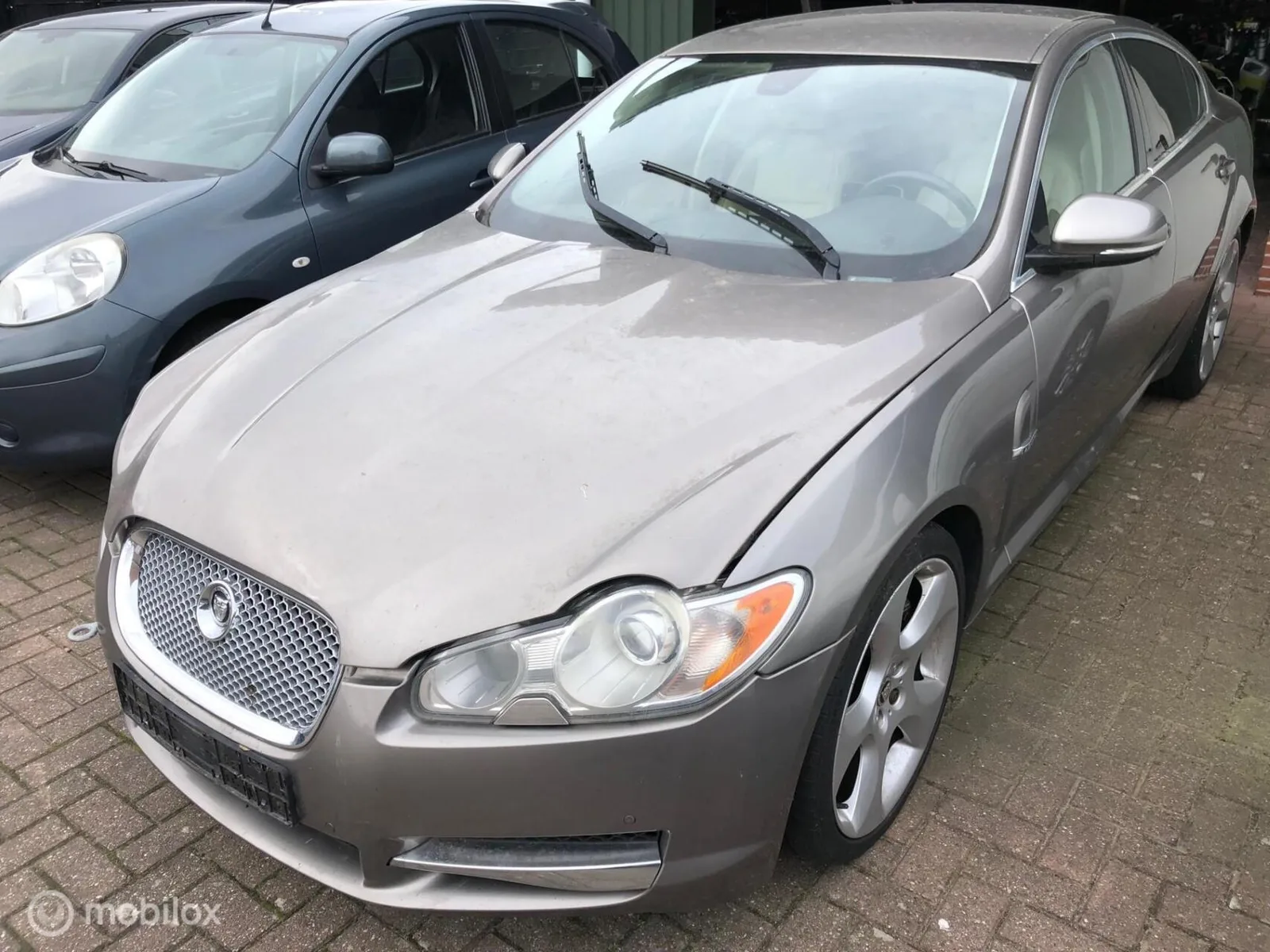 Jaguar XF (2010) — foto 1