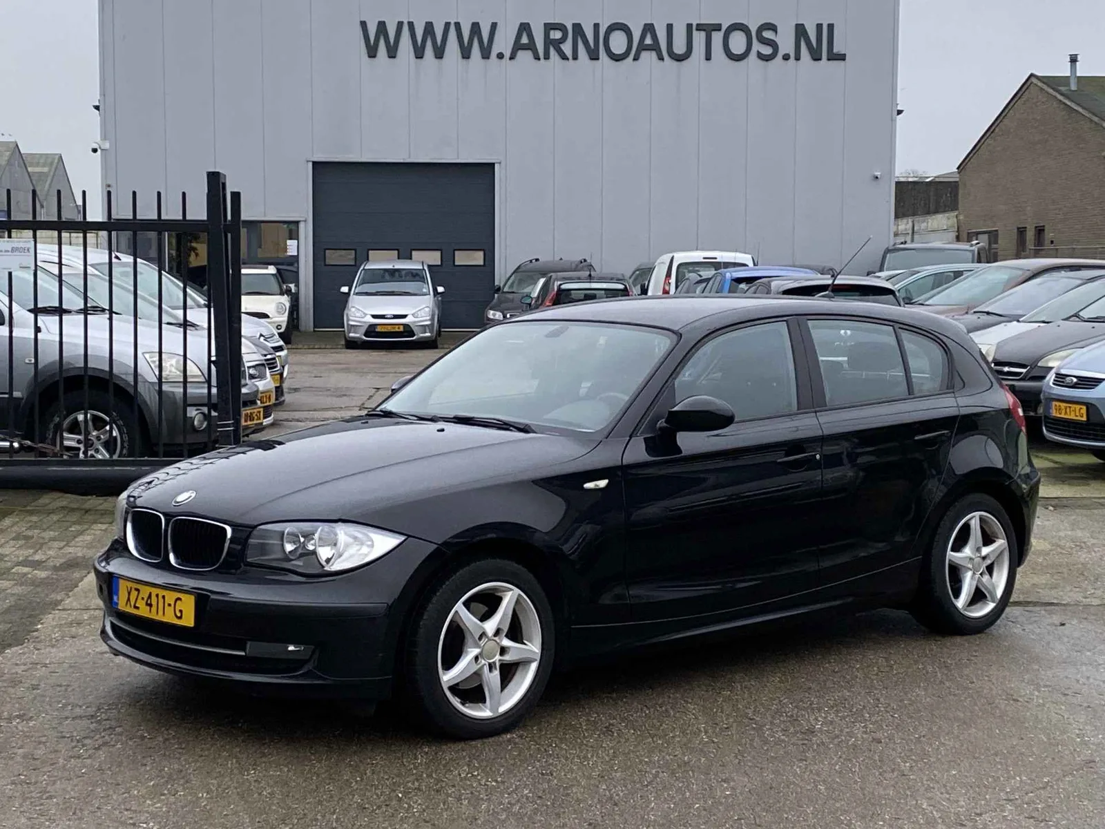 BMW 1-Serie (2009) — foto 1