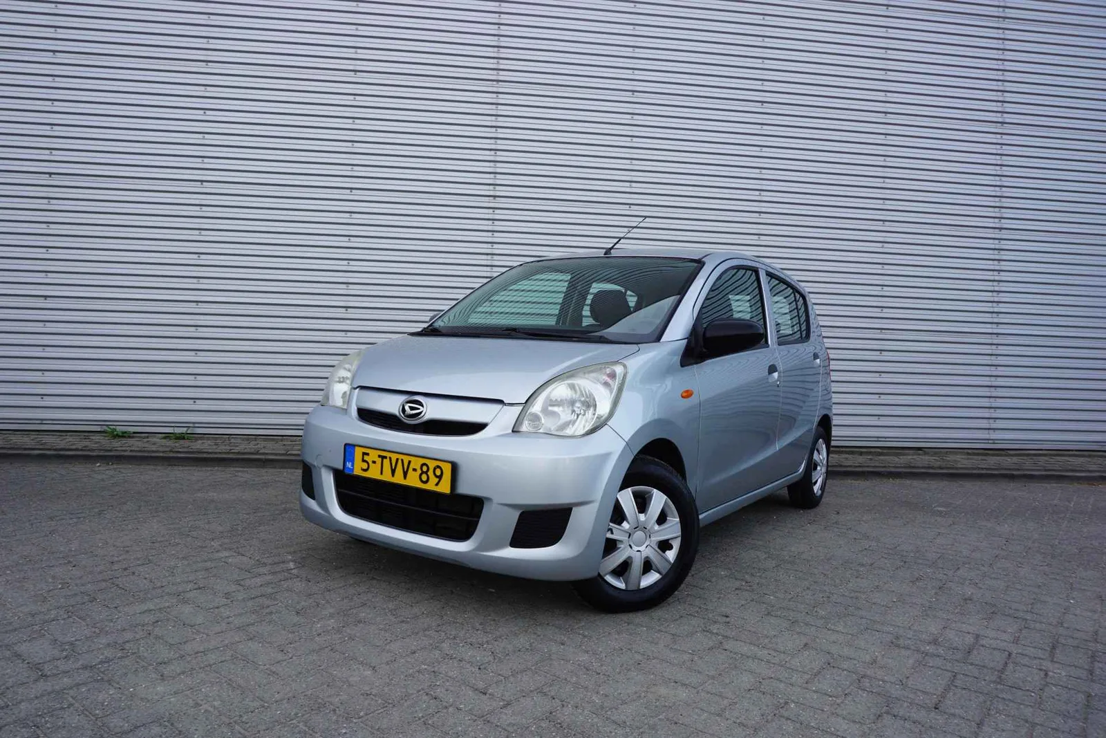 Daihatsu Cuore (2009) — foto 1