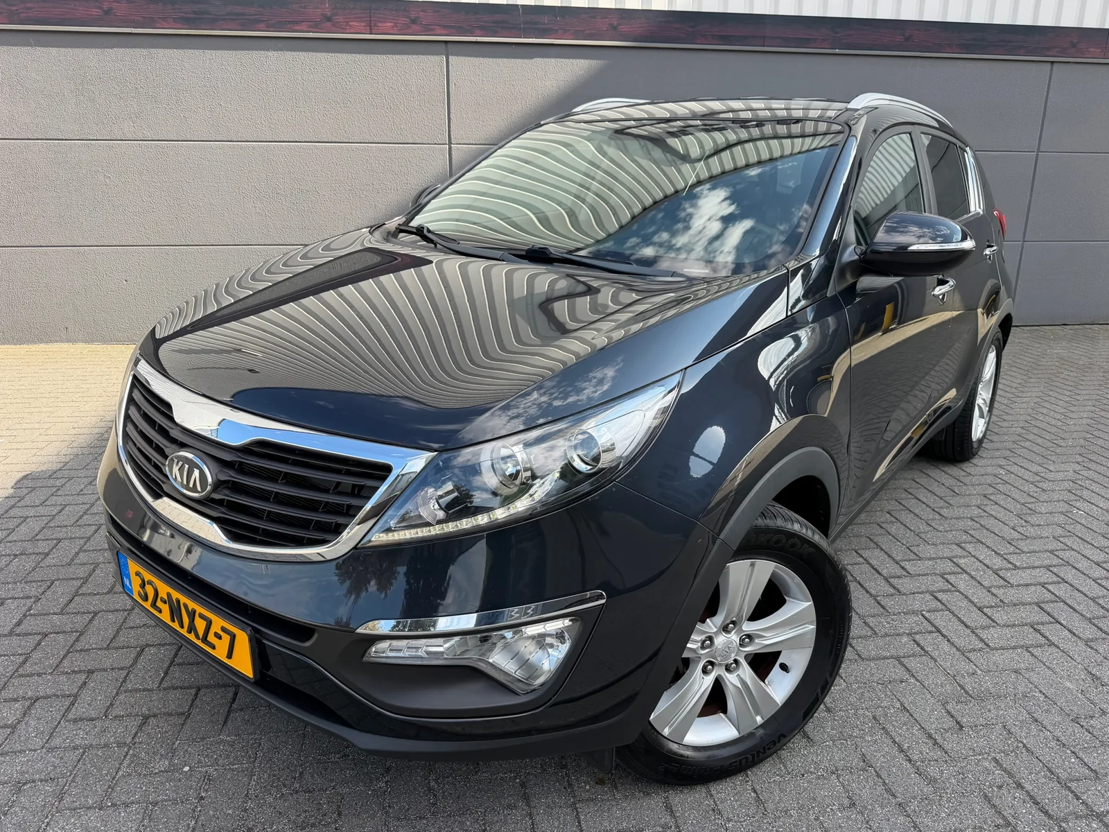 Kia Sportage (2011) — foto 1