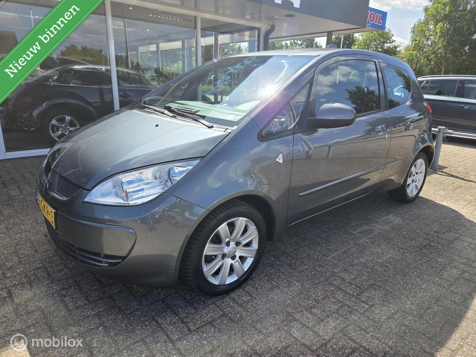 Mitsubishi Colt (2008) — foto 1