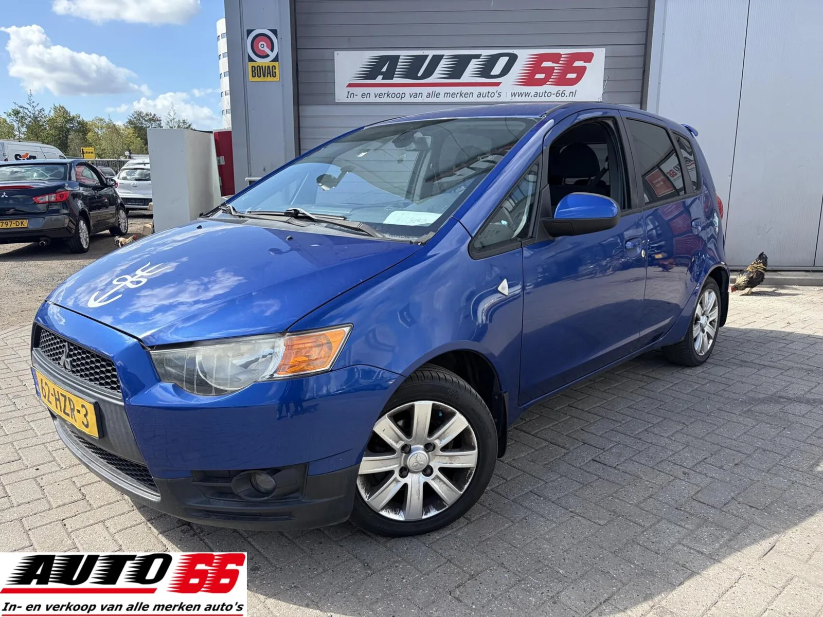 Mitsubishi Colt (2009) — foto 1