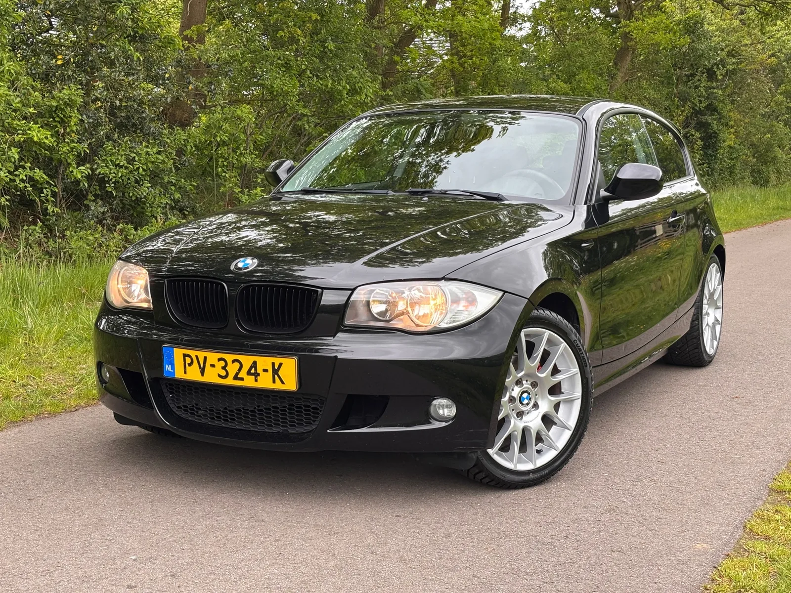 BMW 1-Serie (2010) — foto 1