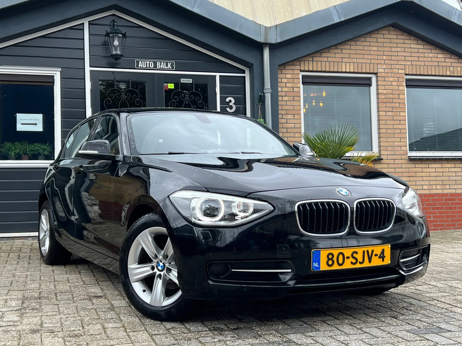 BMW 1-Serie (2011) — foto 1