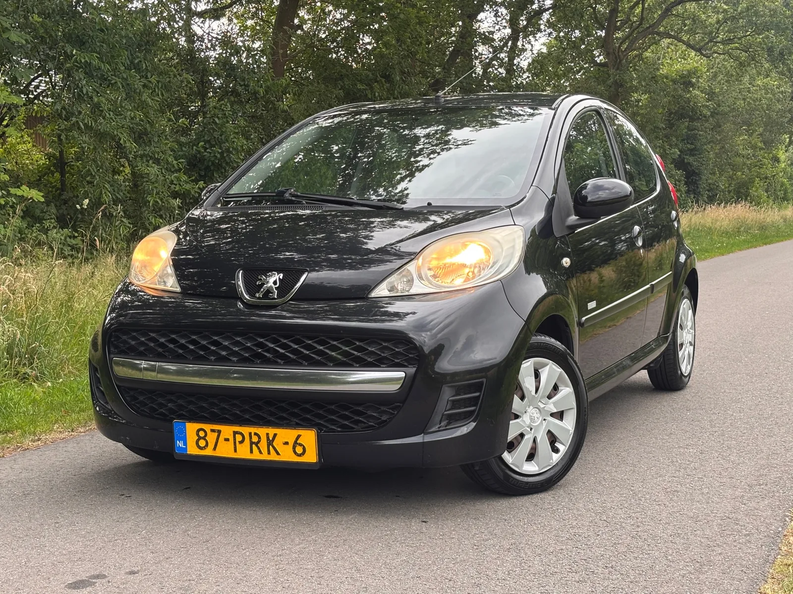 Peugeot 107 (2011) — foto 1