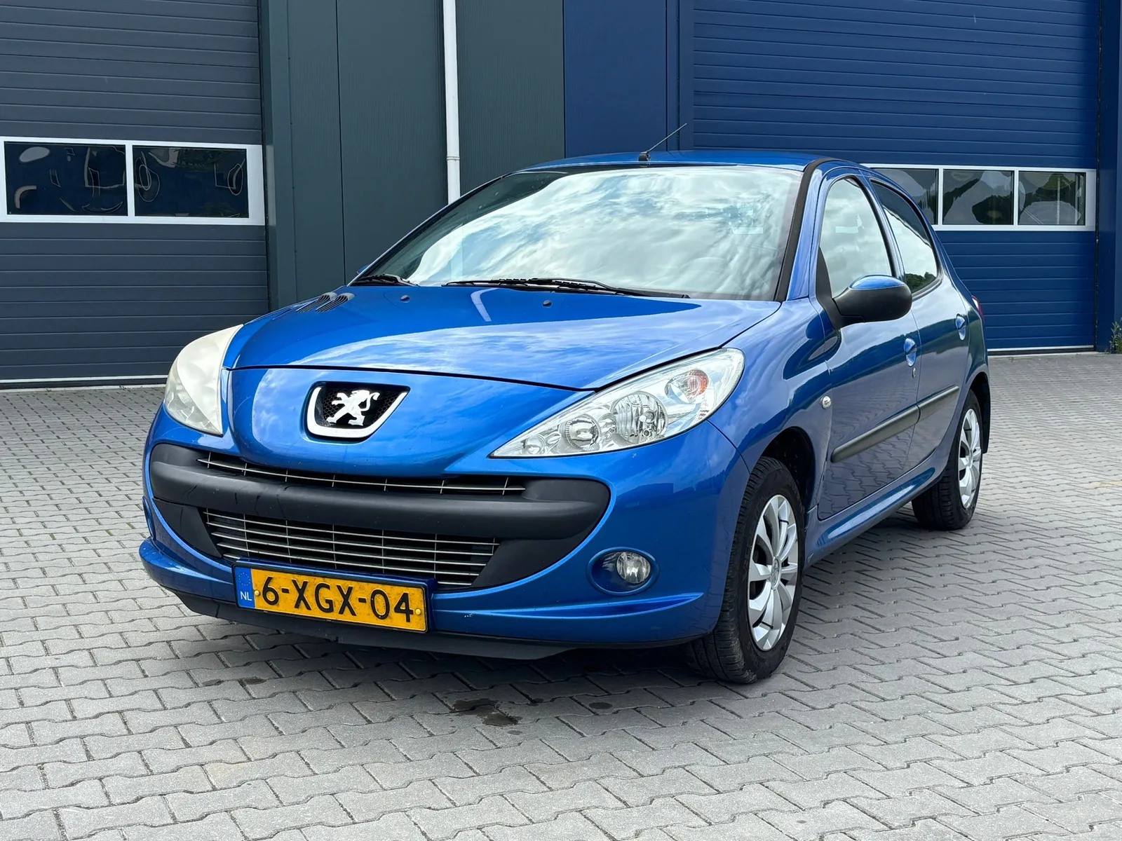 Peugeot 206 (2011) — foto 1