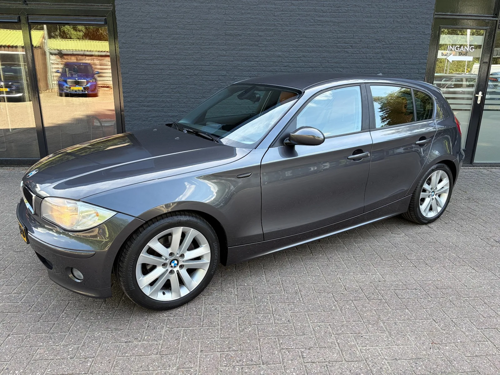 BMW 1-Serie (2006) — foto 1