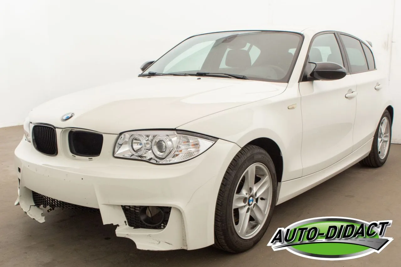 BMW 1-Serie (2009) — foto 1