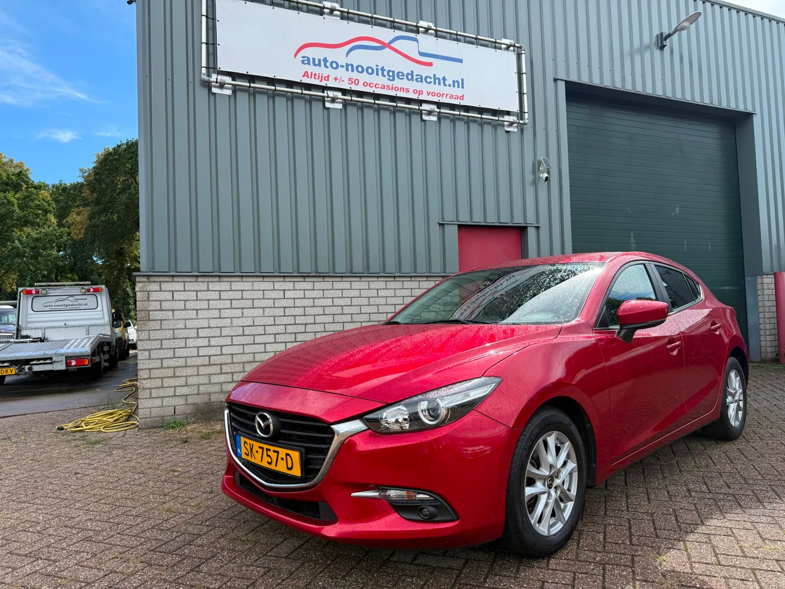 Mazda 3 (2018) — foto 1