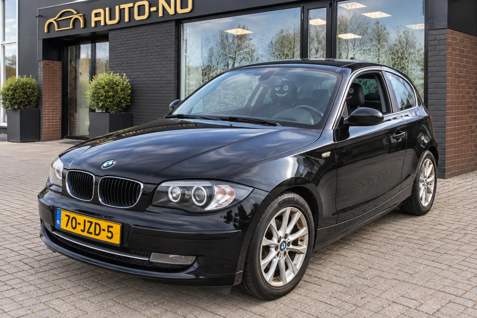 BMW 1-Serie (2009) — foto 1