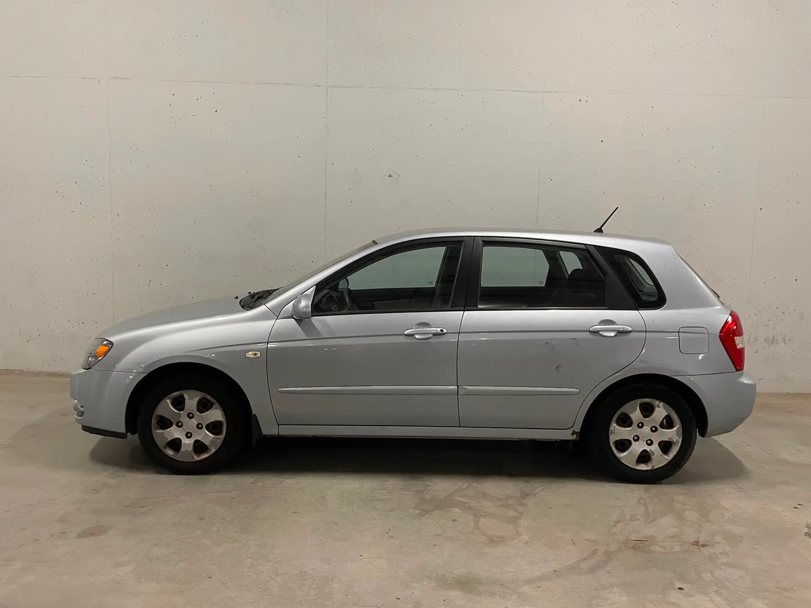 Kia Cerato (2004) — foto 1