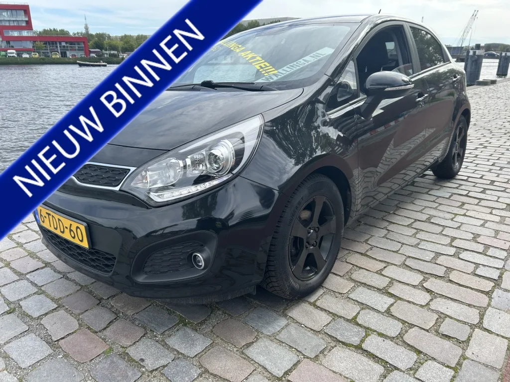 Kia Rio (2014) — foto 1