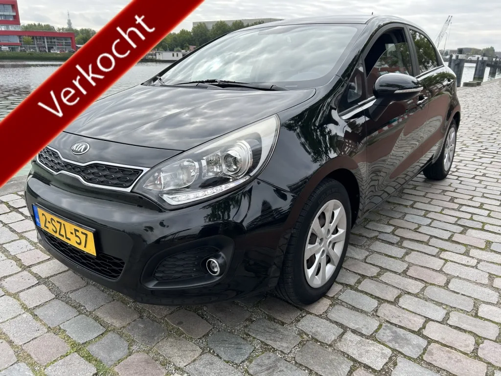 Kia Rio (2014) — foto 1