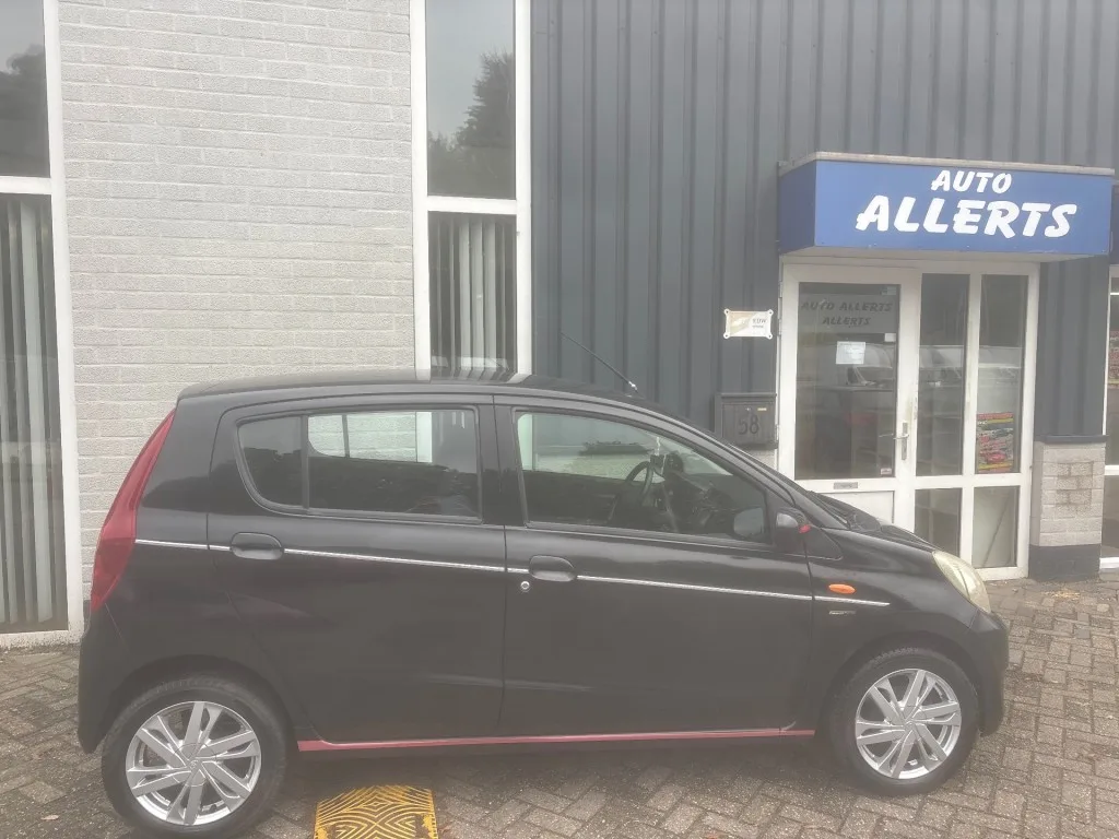 Daihatsu Cuore (2008) — foto 1