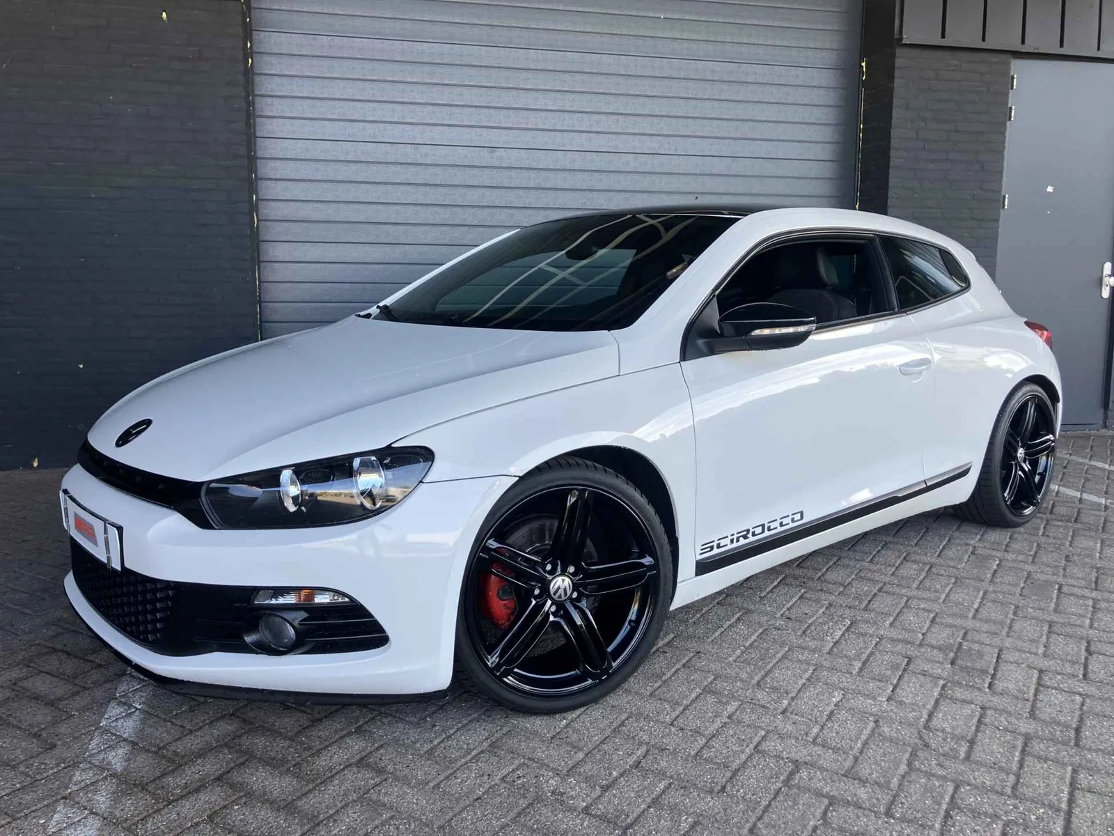 Volkswagen Scirocco (2009) — foto 1