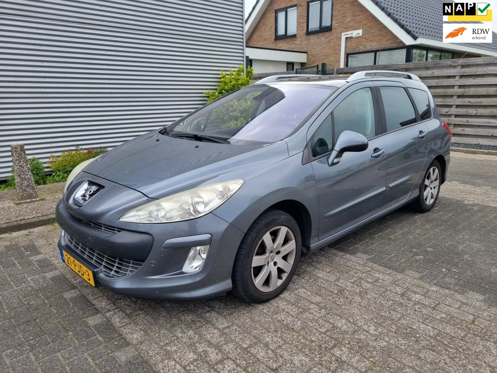 Peugeot 308 (2011) — foto 1