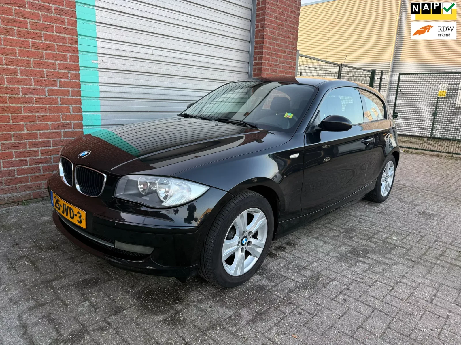 BMW 1-Serie (2009) — foto 1