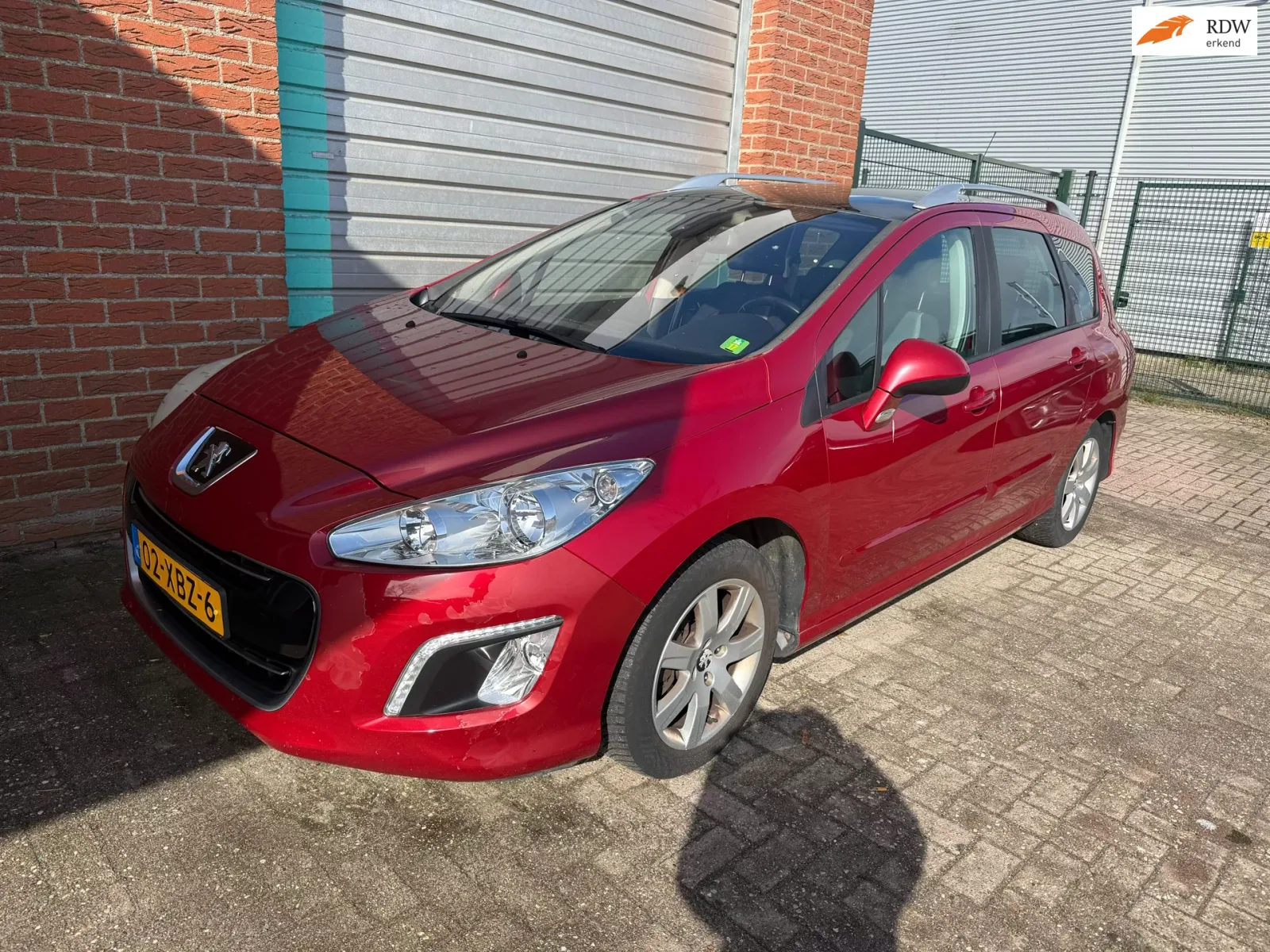 Peugeot 308 (2012) — foto 1