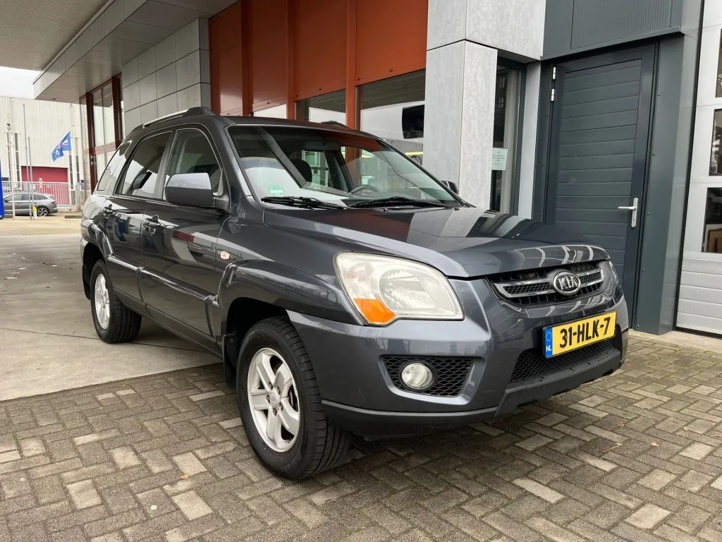 Kia Sportage (2009) — foto 1