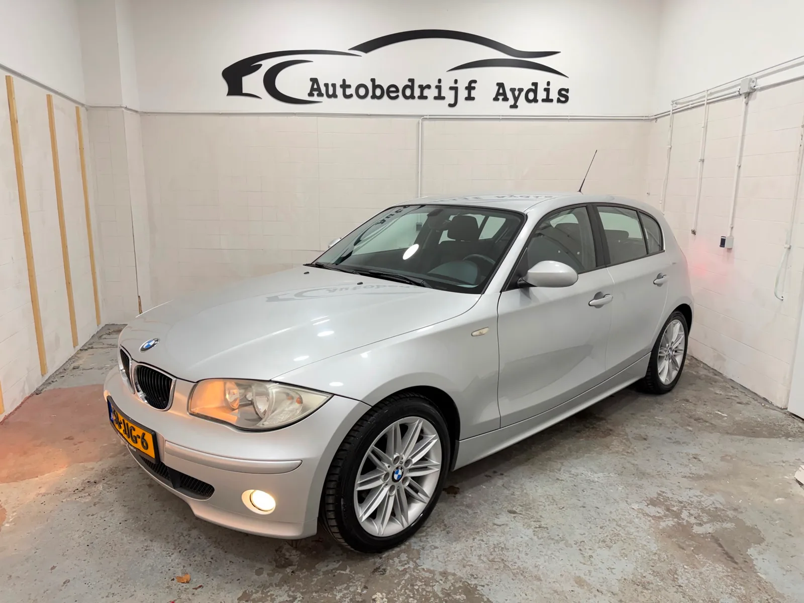 BMW 1-Serie (2006) — foto 1