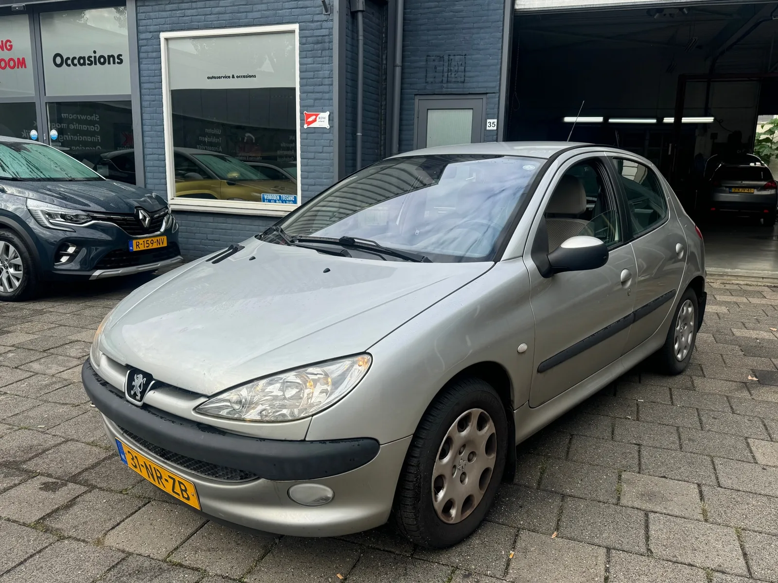 Peugeot 206 (2004) — foto 1