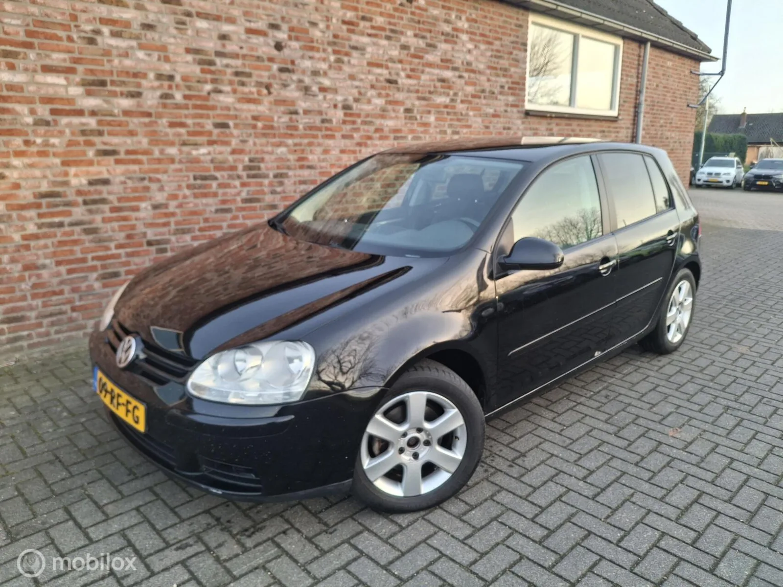 Volkswagen Golf (2005) — foto 1