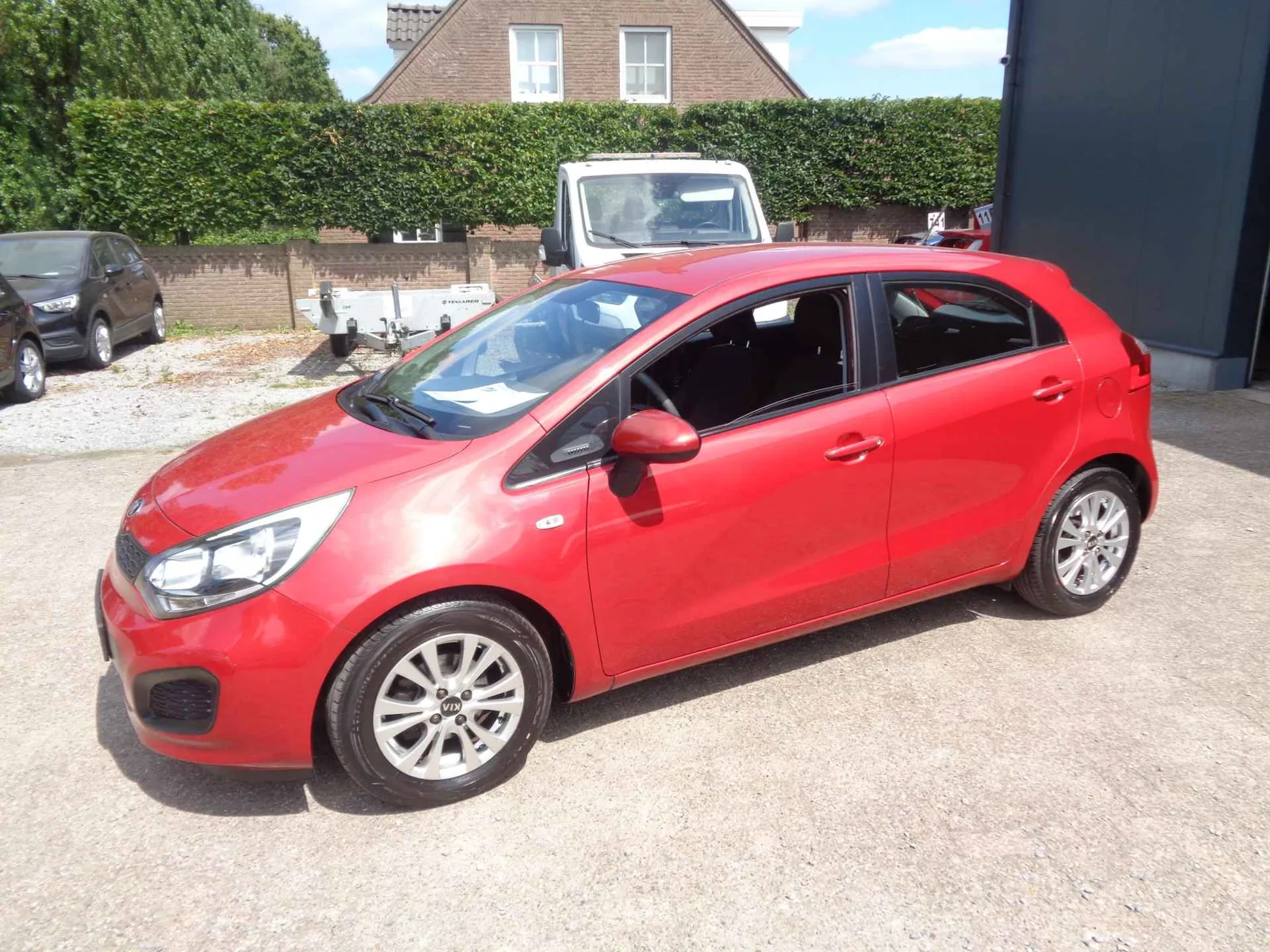 Kia Rio (2014) — foto 1