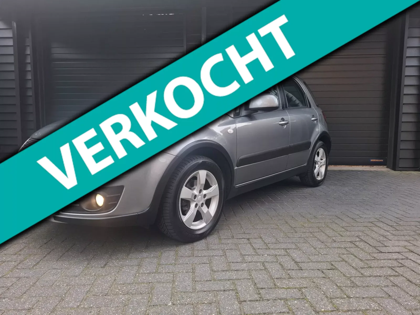 Suzuki SX4 (2011) — foto 1