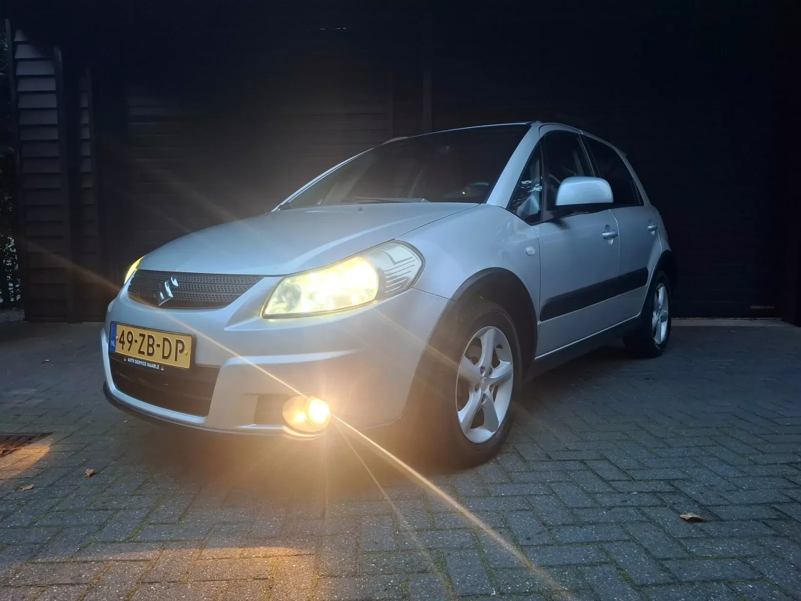Suzuki SX4 (2008) — foto 1