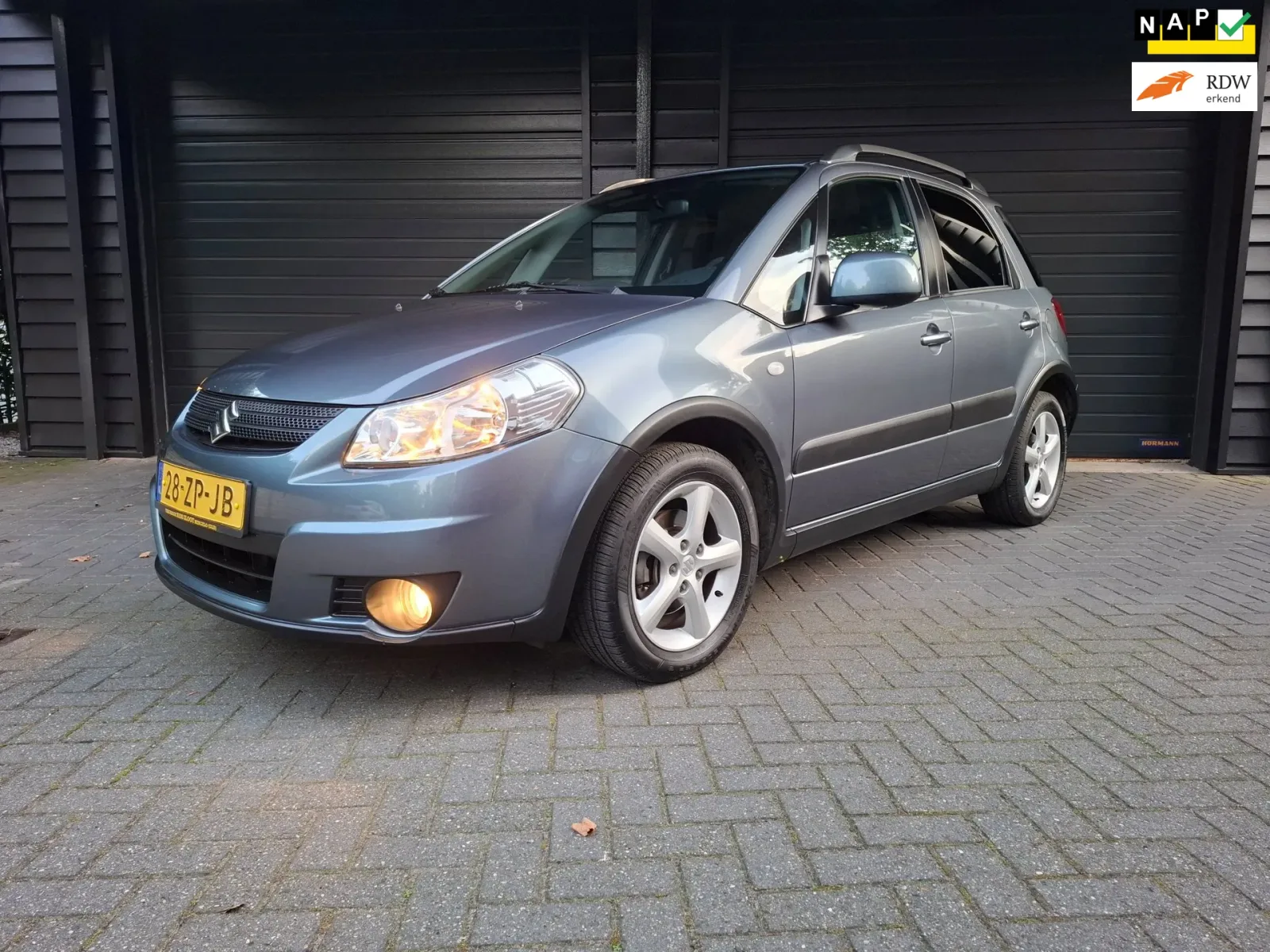 Suzuki SX4 (2008) — foto 1