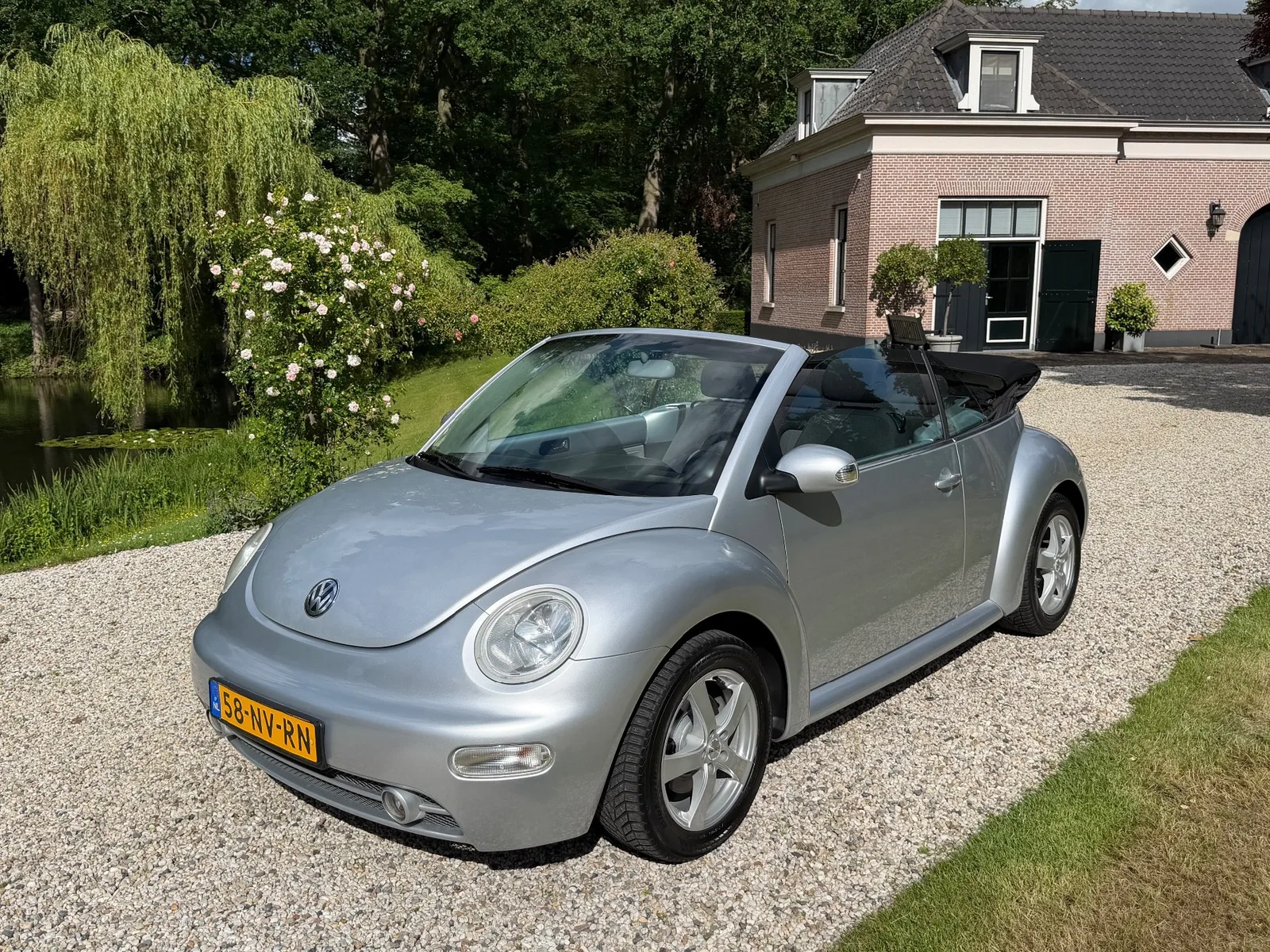Volkswagen New Beetle (2004) — foto 1