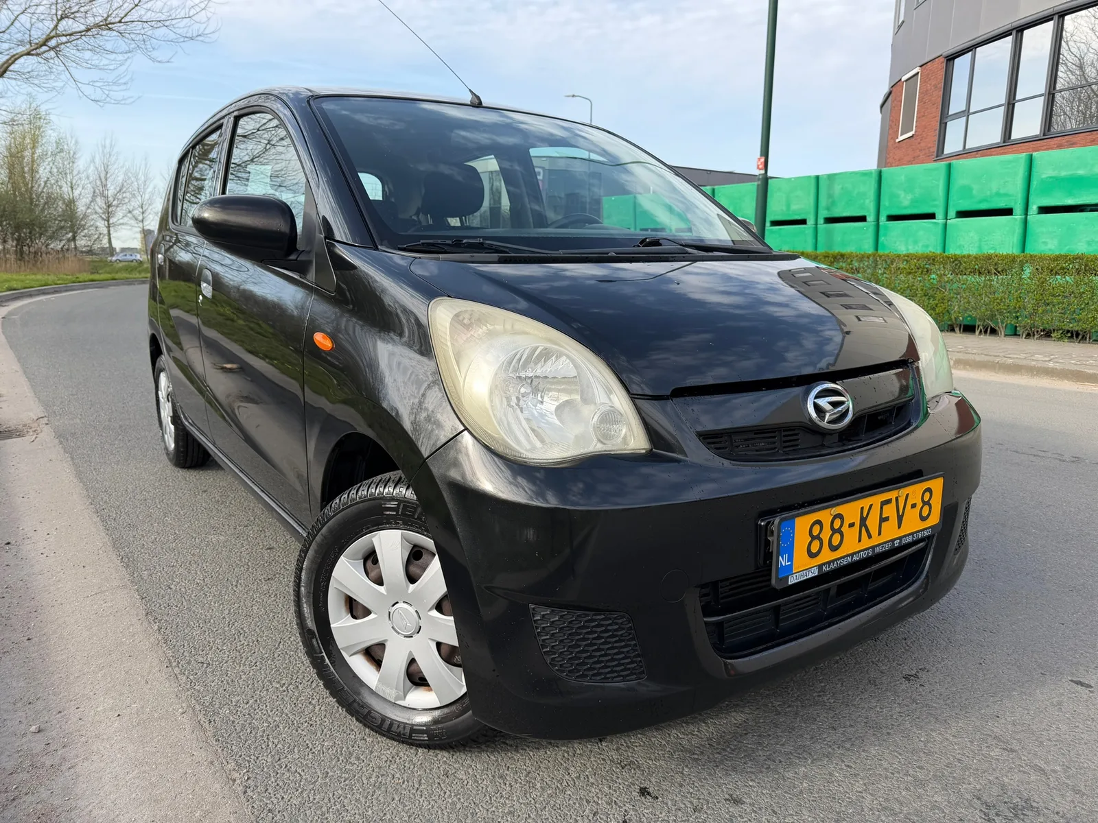 Daihatsu Cuore (2009) — foto 1