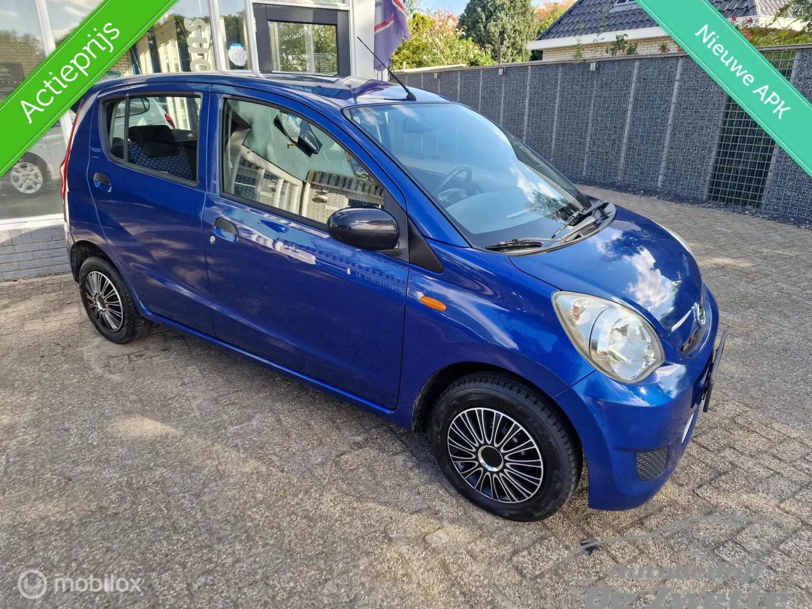 Daihatsu Cuore (2010) — foto 1